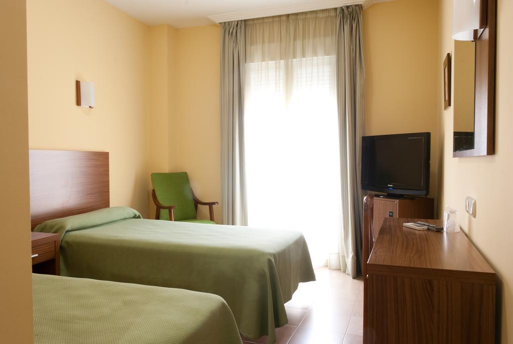 Hotel Hidalgo Quijada Алькасар-де-Сан-Хуан Экстерьер фото